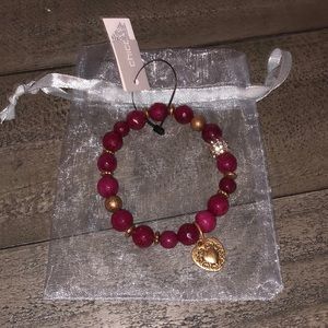 Chico’s stretch bracelet with heart pendant